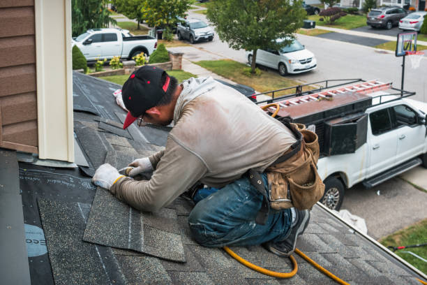 Professional Metal Roofing technician working in Vanderbilt, TX